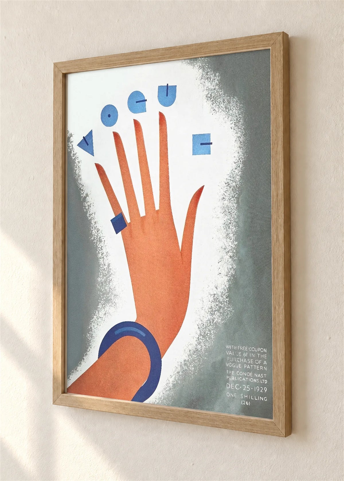 Vogue, ruka i geometrijska slova, 1929., braon ram, detalj